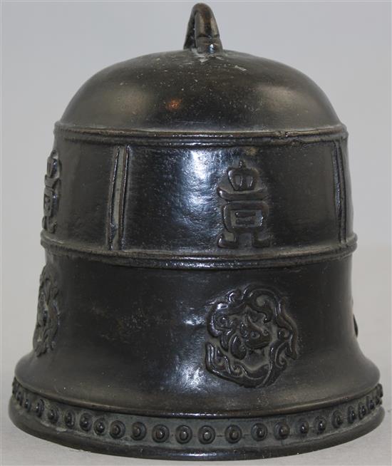 A Chinese or Japanese bronze small temple bell, 14cm